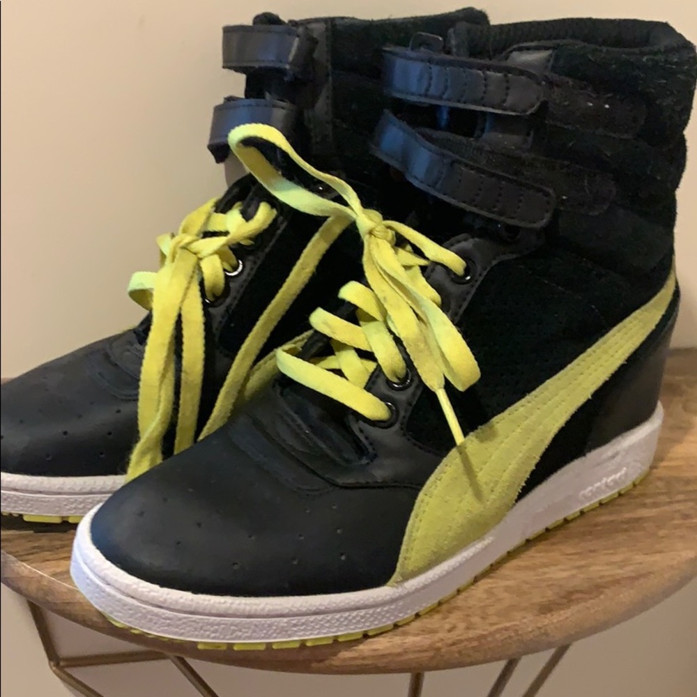 Puma high top wedge tennis shoes